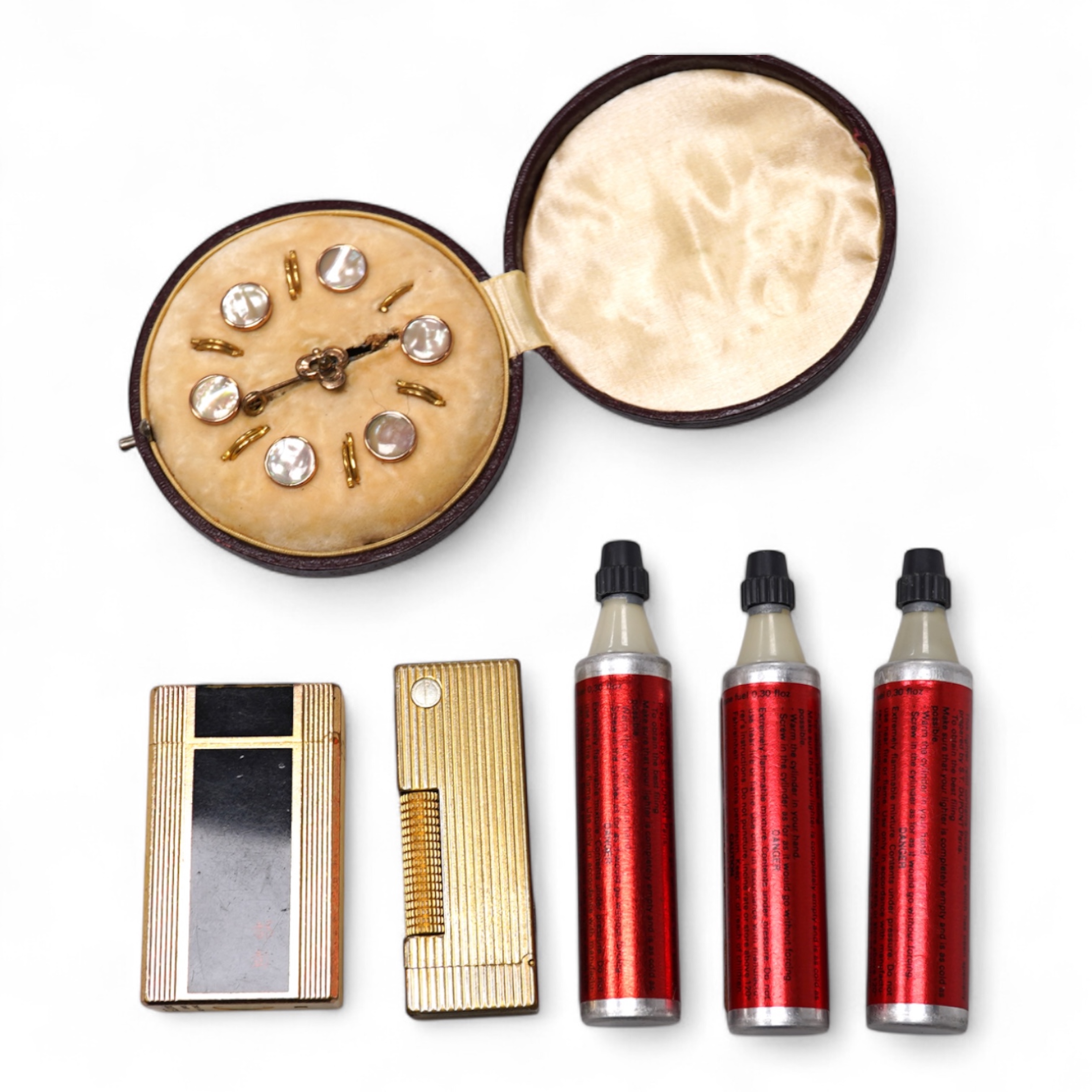 Sundry items comprising two Dupont and Dunhill lighters and cased gold and a set of cased pearl dress studs
